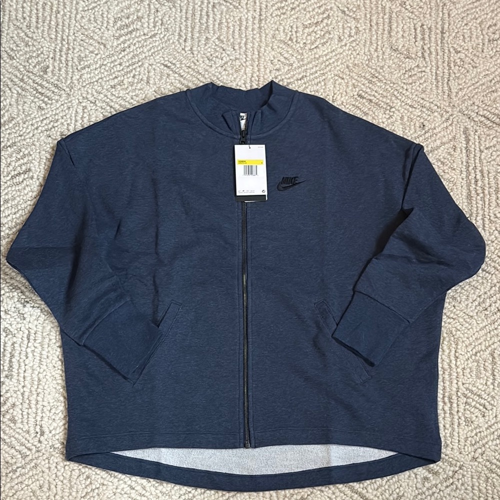 Nike women’s size small & M blue zip up sweatshirt.  New